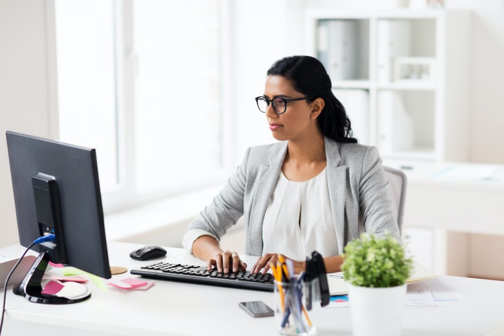businesswoman with computer working at office